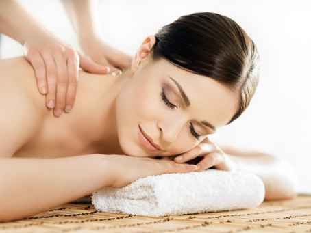 Young and healthy woman in spa salon. Traditional Swedish massag