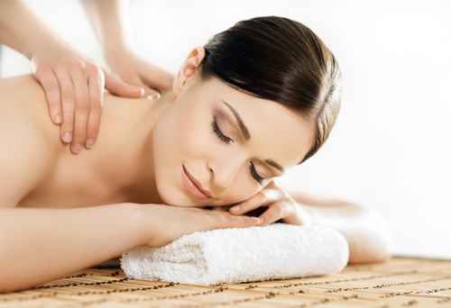 Young and healthy woman in spa salon. Traditional Swedish massag